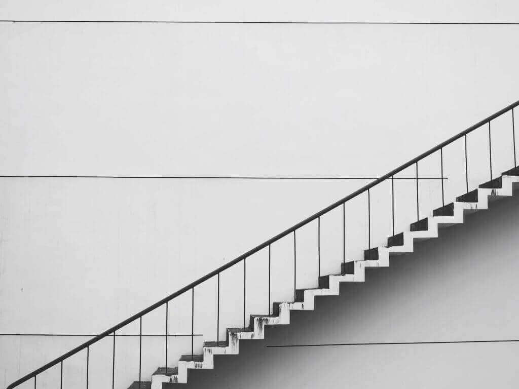 Picture of a white staircase, negotiation, sound negotiator, ai.