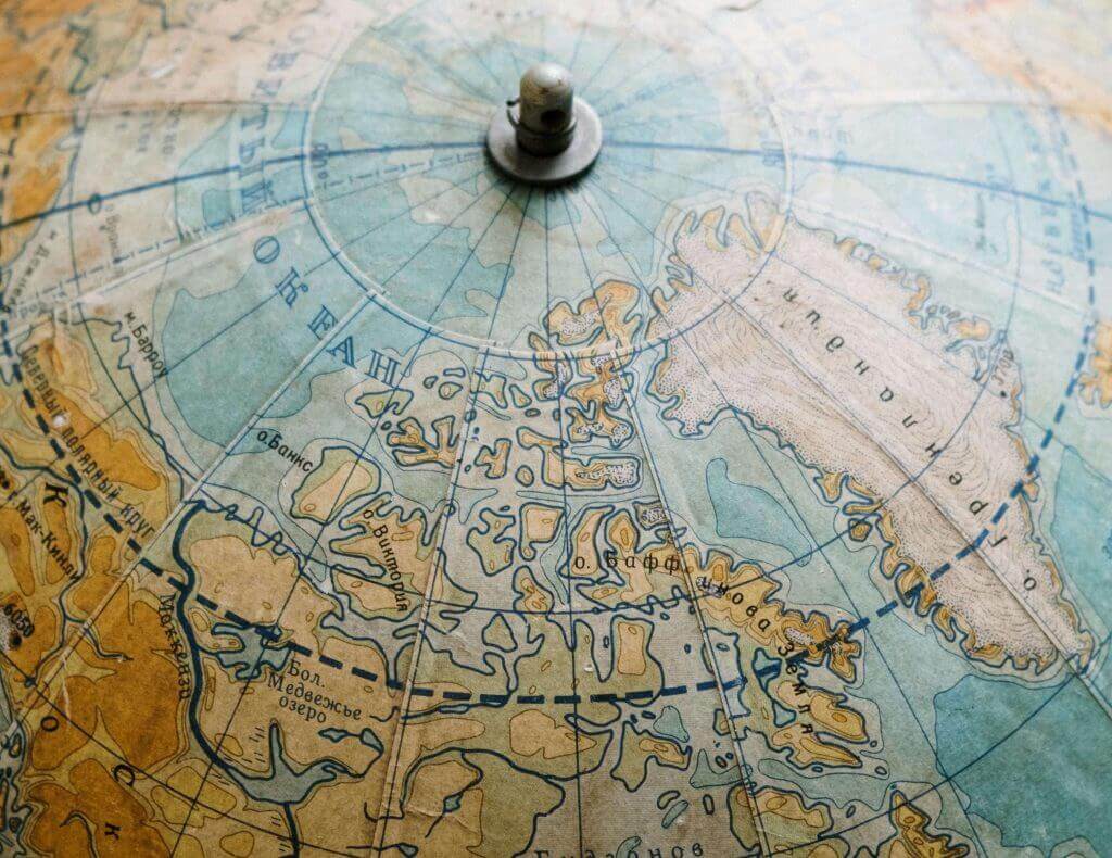 Close up of old fashioned globe, navigating strategies, sound negotiator, ai.